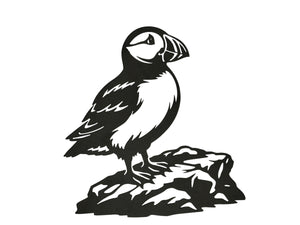 Atlantic puffin metal wall art perched on coastal rock, high-contrast steel silhouette design